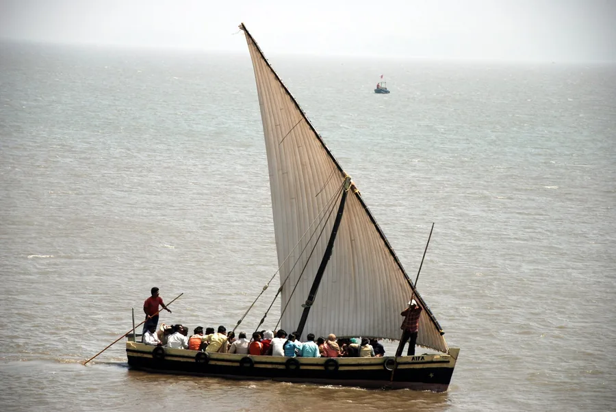 A sailboat carrying visitors across to Murud-Janjira fort