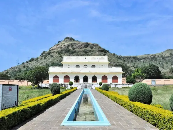 Soneri Mahal, a 17th-century palace that now houses a museum, behind its garden water channel