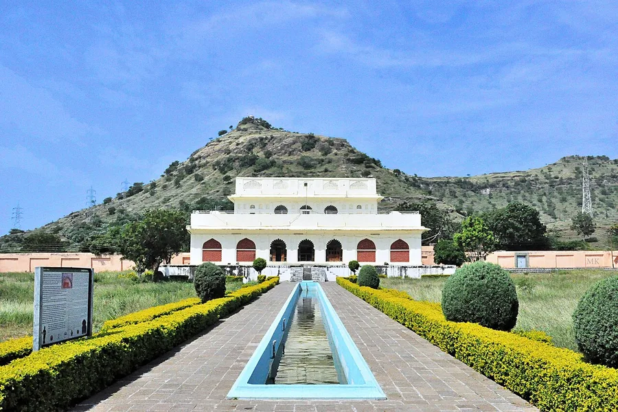 Soneri Mahal, a 17th-century palace that now houses a museum, behind its garden water channel