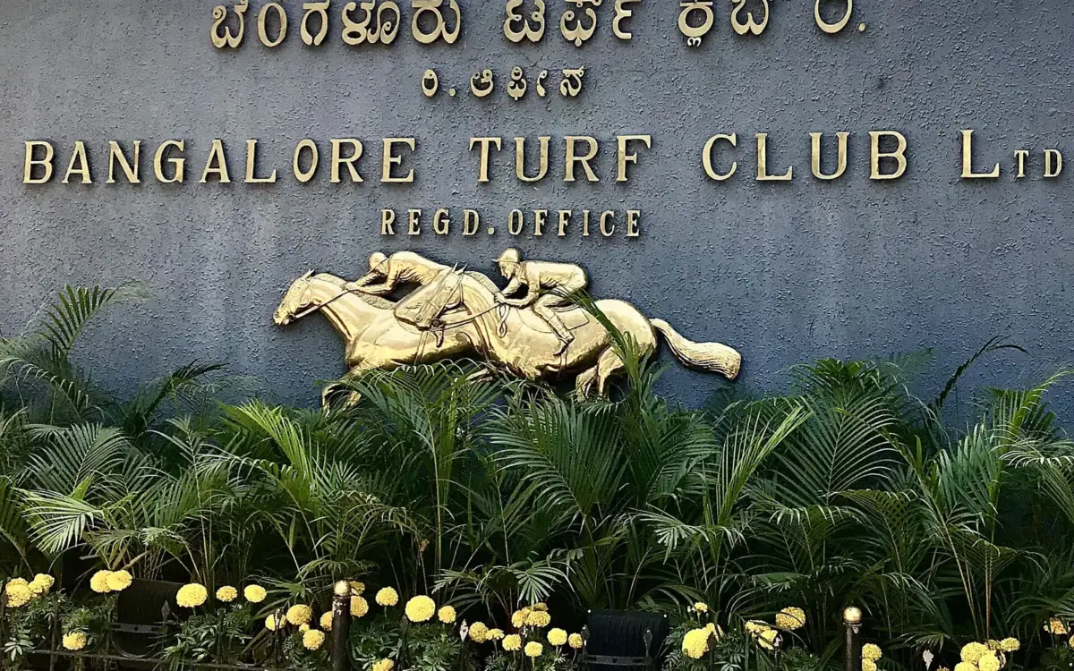 Bangalore Turf Club's grand façade with lush green surroundings