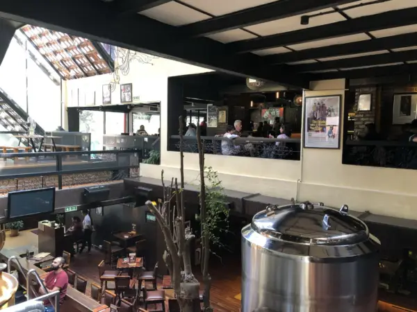 Toit Brewpub's lively interior with craft beers and rustic décor