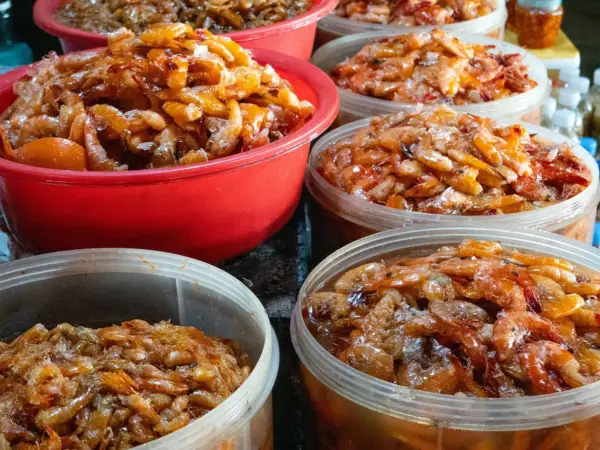Tubs of dried seafood for sale at the crab market in Kep, Cambodia