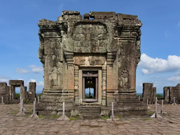 Phnom Bakheng, the hilltop temple at Angkor, under a blue sky