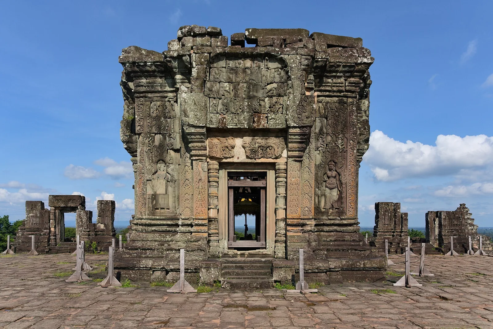 Phnom Bakheng, the hilltop temple at Angkor, under a blue sky