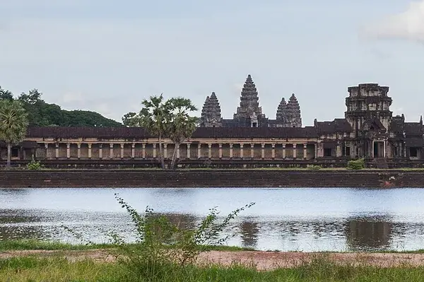 Panoramic view of Angkor Wat across the pond in front of the temple
