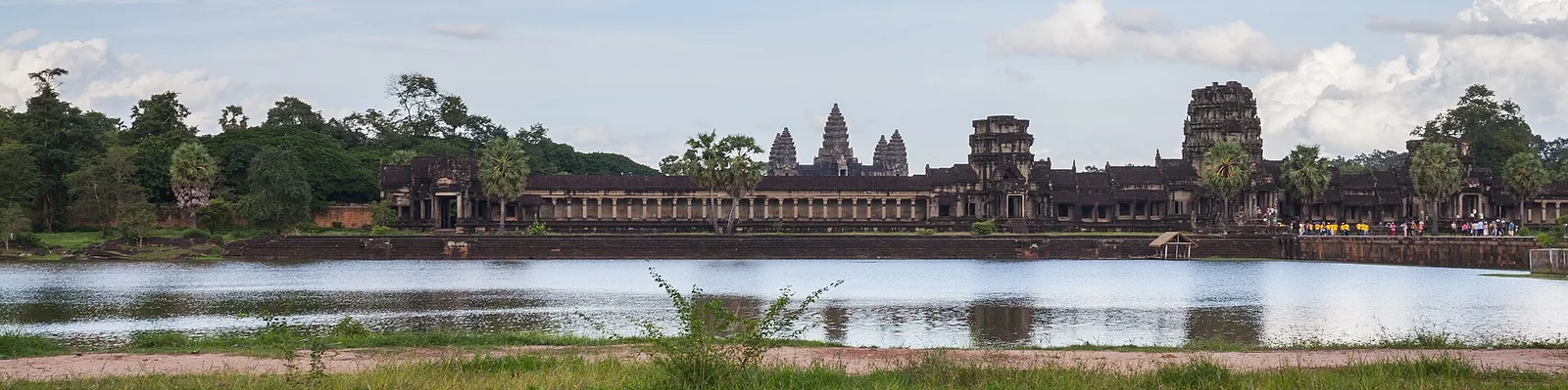 Panoramic view of Angkor Wat across the pond in front of the temple