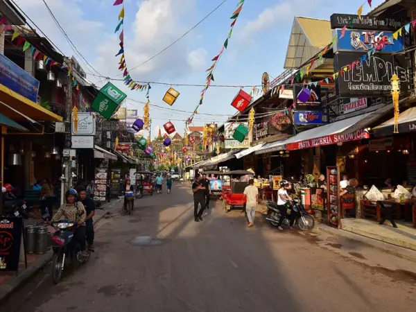 A street with shops and restaurants in Siem Reap