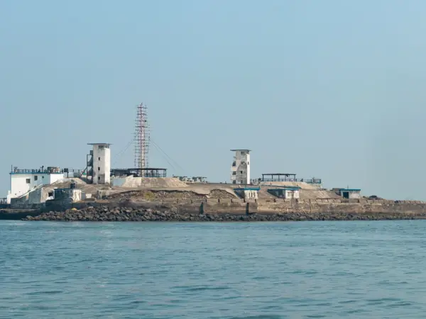 Middle Ground Coastal Battery island showing stone gun emplacements and sea horizon