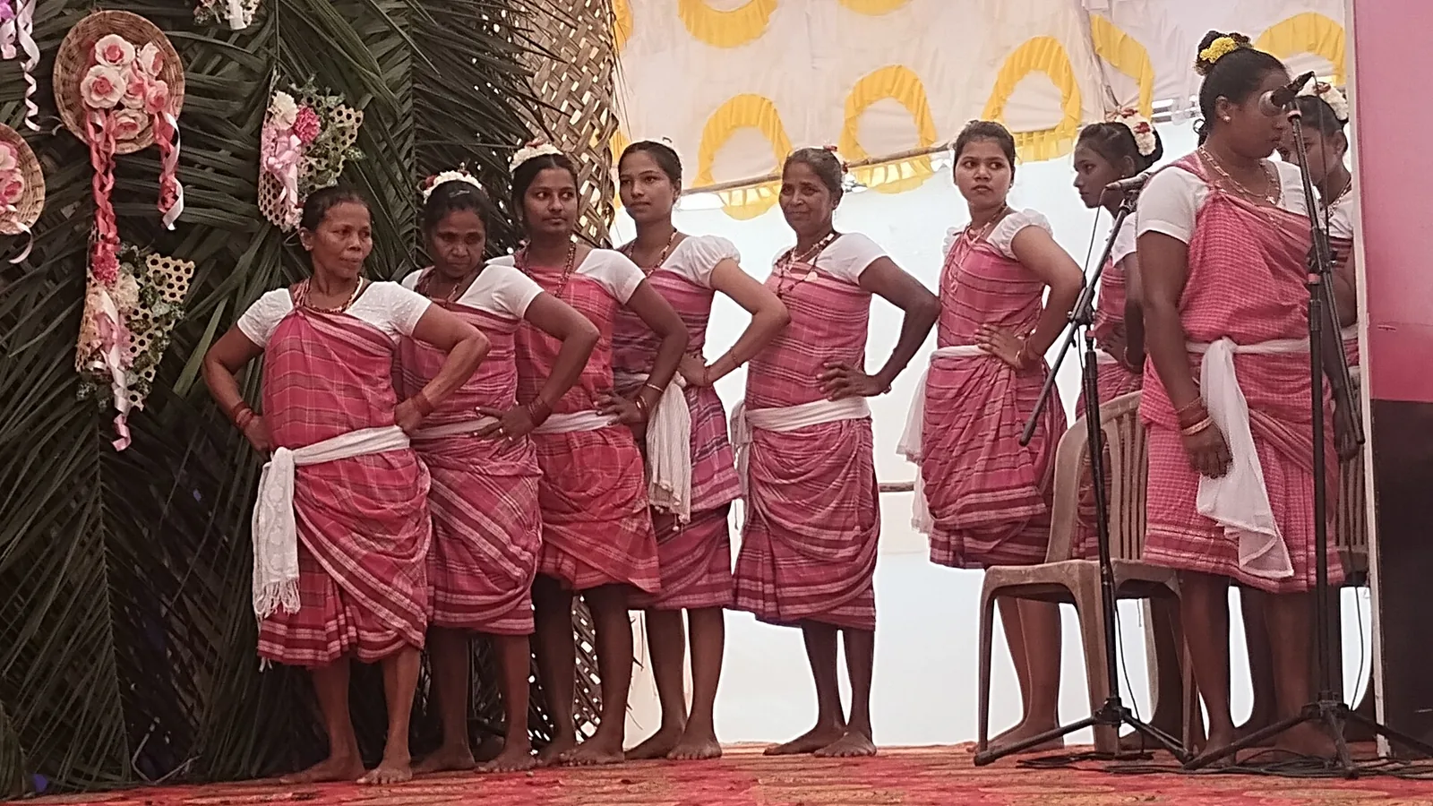Adivasi festival in Quepem, January 2025: performers in traditional dress dancing on stage