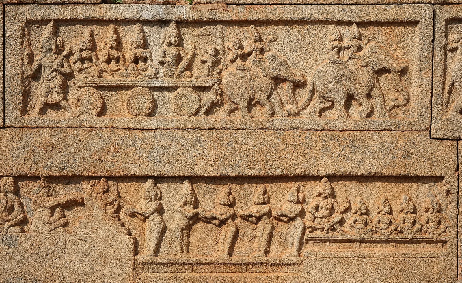 Carved reliefs on the Court Wall of Hazara Rama Temple, Hampi
