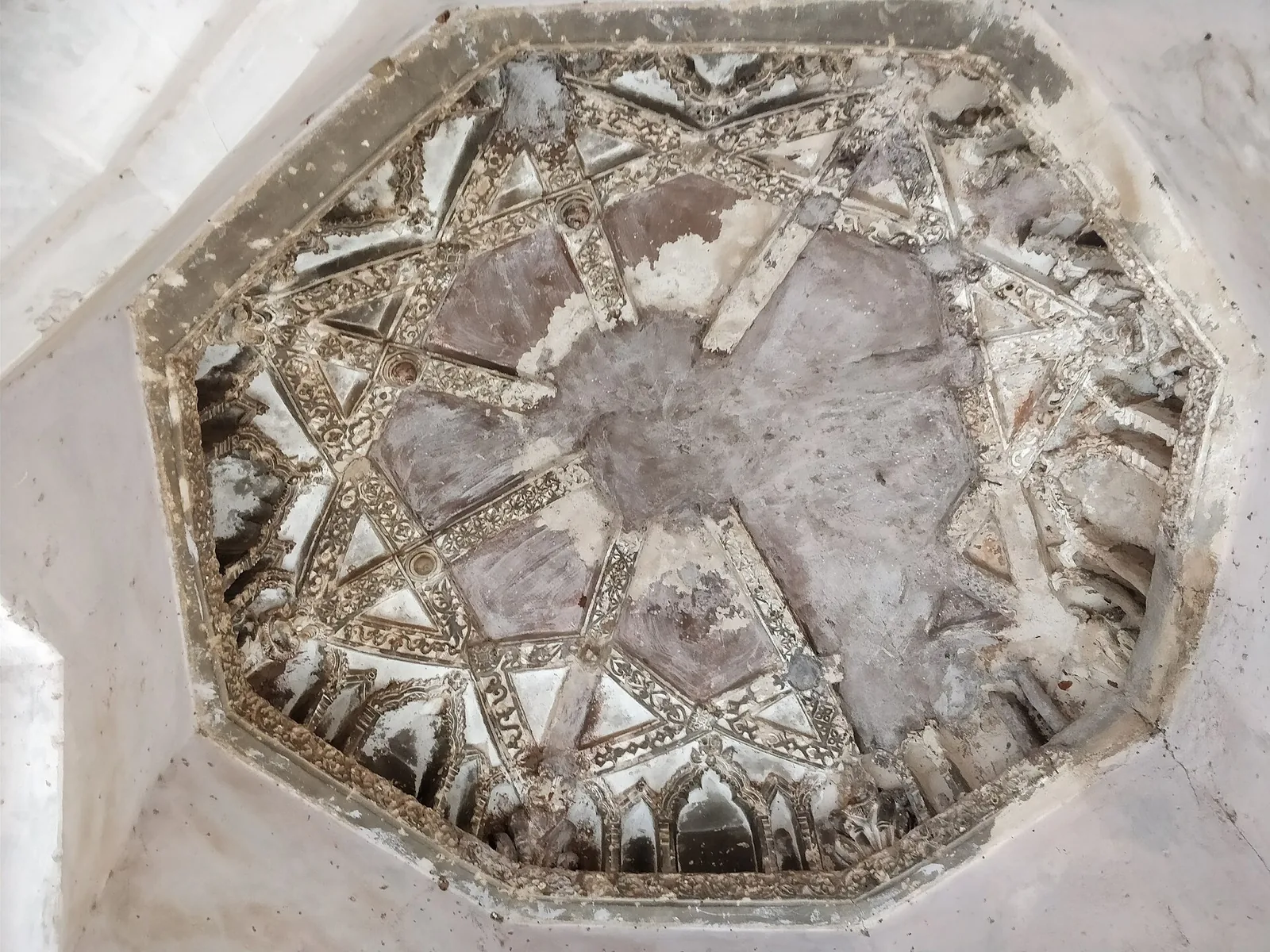 Carved octagonal ceiling of the Queen's Bath, Hampi