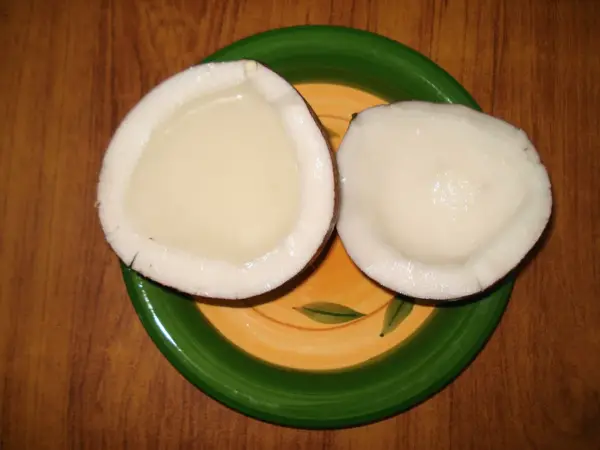 A fresh coconut split open