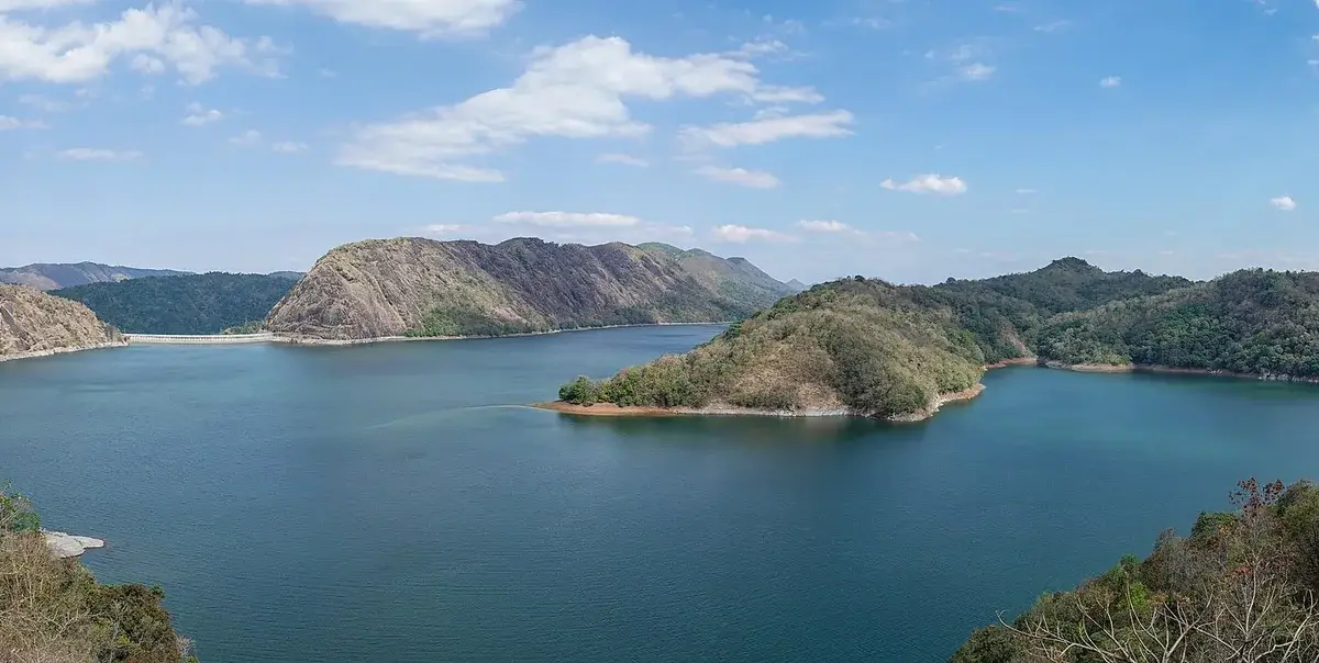 Panorama of Idukki Reservoir and Dam with Kurathi Mala hill left and Kuravan Mala hill right.