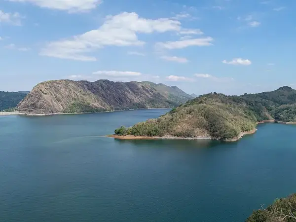 Panorama of Idukki Reservoir and Dam with Kurathi Mala hill left and Kuravan Mala hill right.