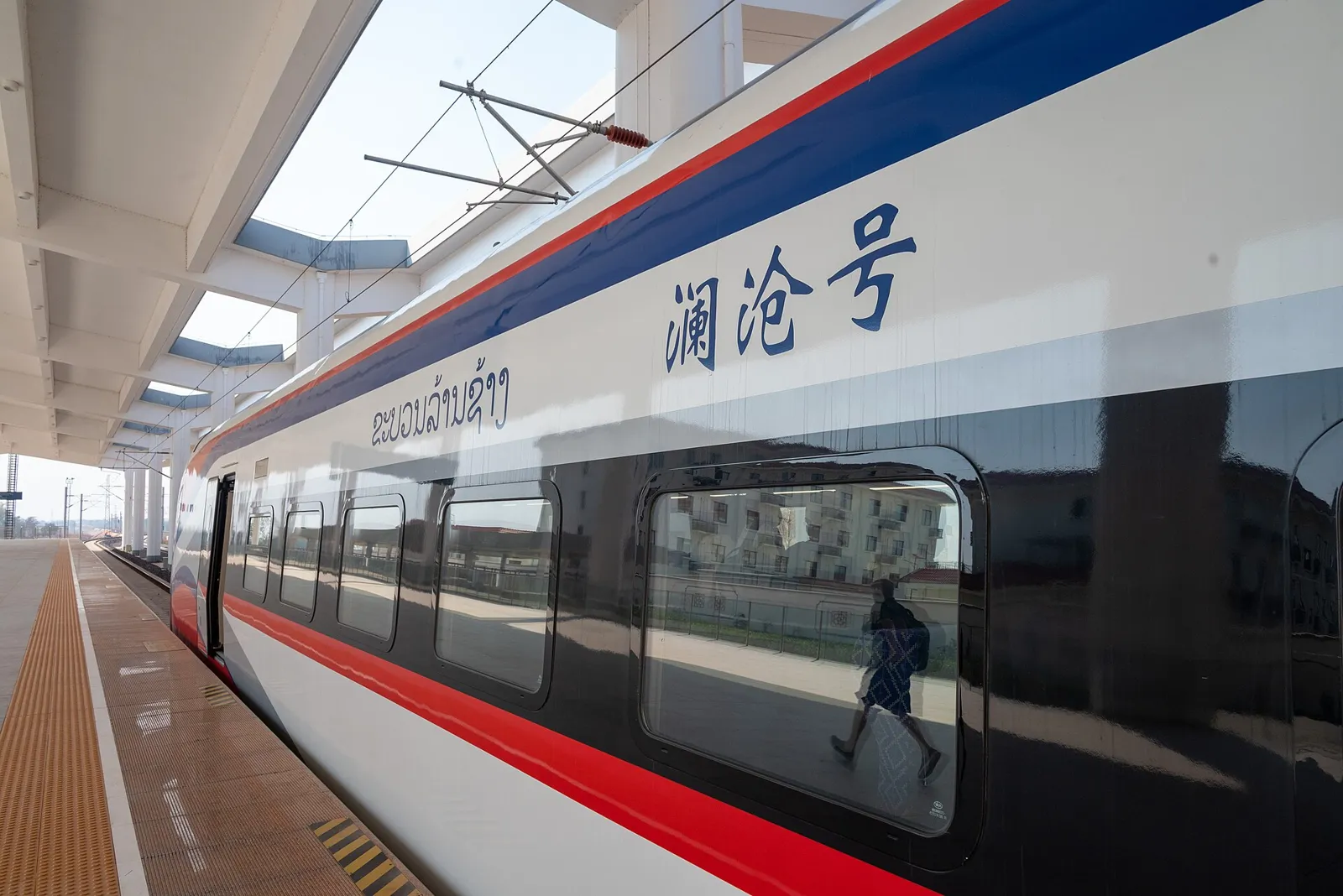 A Laos–China Railway train at a station in Laos