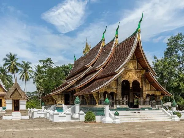 The sweeping roofs of Wat Xieng Thong temple in Luang Prabang