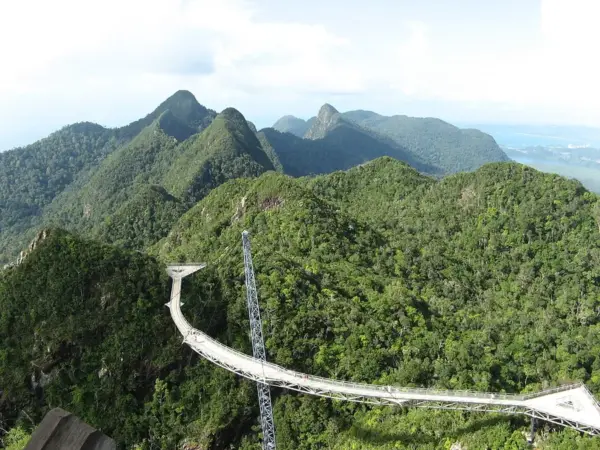 The Langkawi Sky Bridge curving over the forested peaks of Gunung Mat Cincang