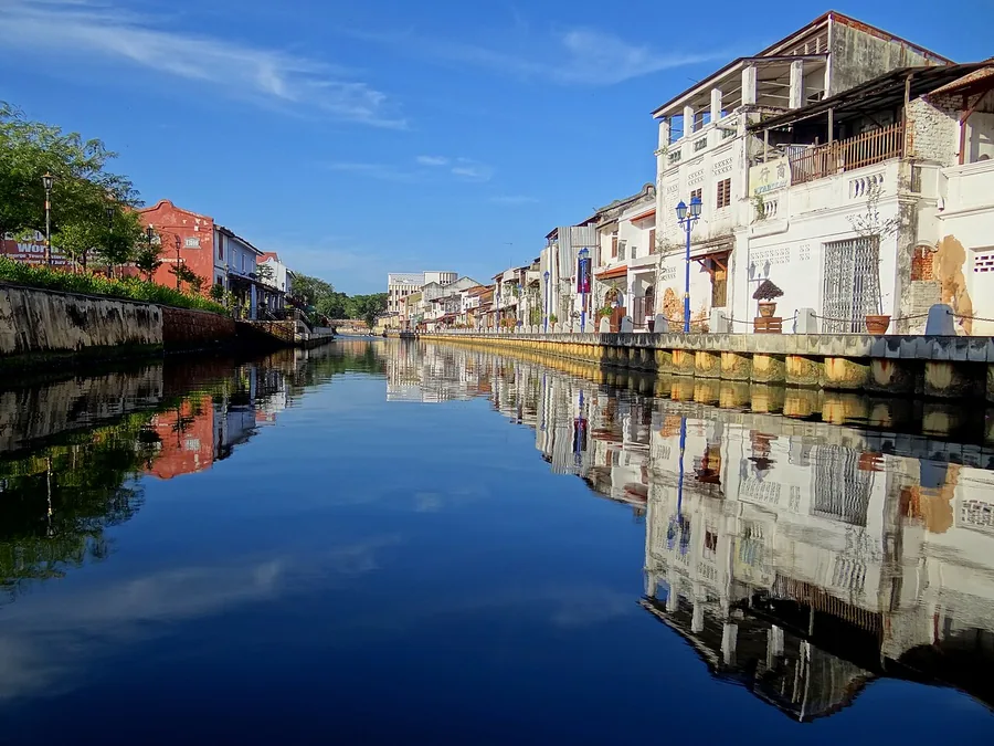 Shophouses reflected in the Melaka River