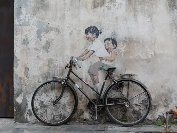 A street-art mural on a shophouse wall in George Town, Penang