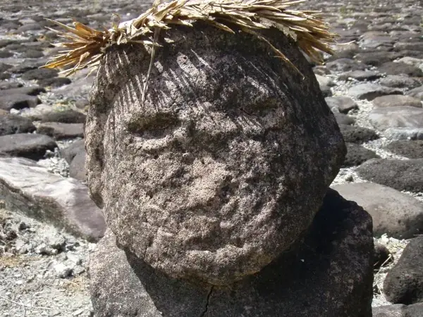 Carved stone figure at the Taputapuātea marae
