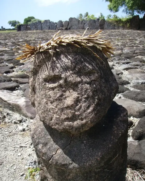 Carved stone figure at the Taputapuātea marae